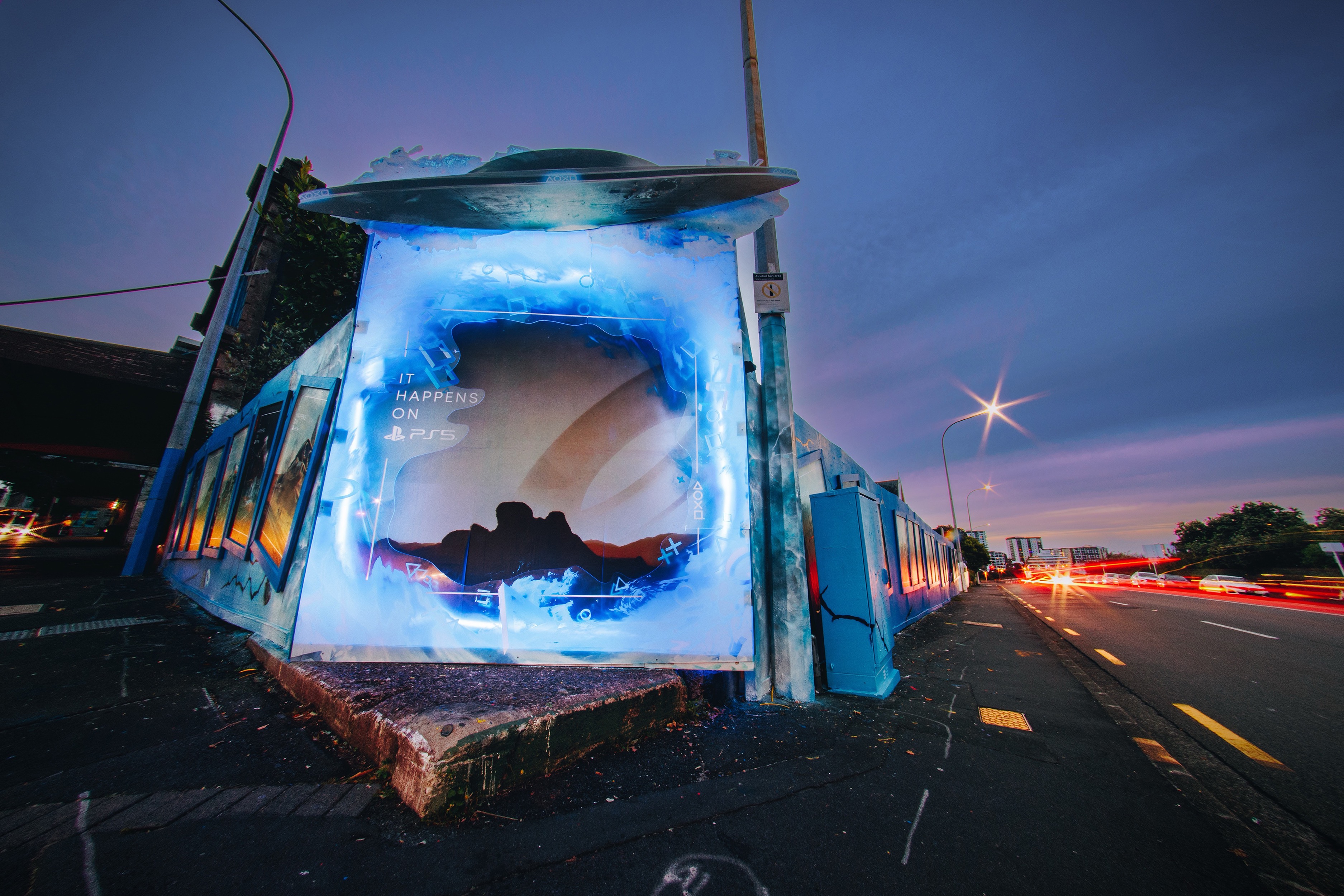 PlayStation It Happens On PS5 display — view from Alex Evans St and Symonds St, Auckland