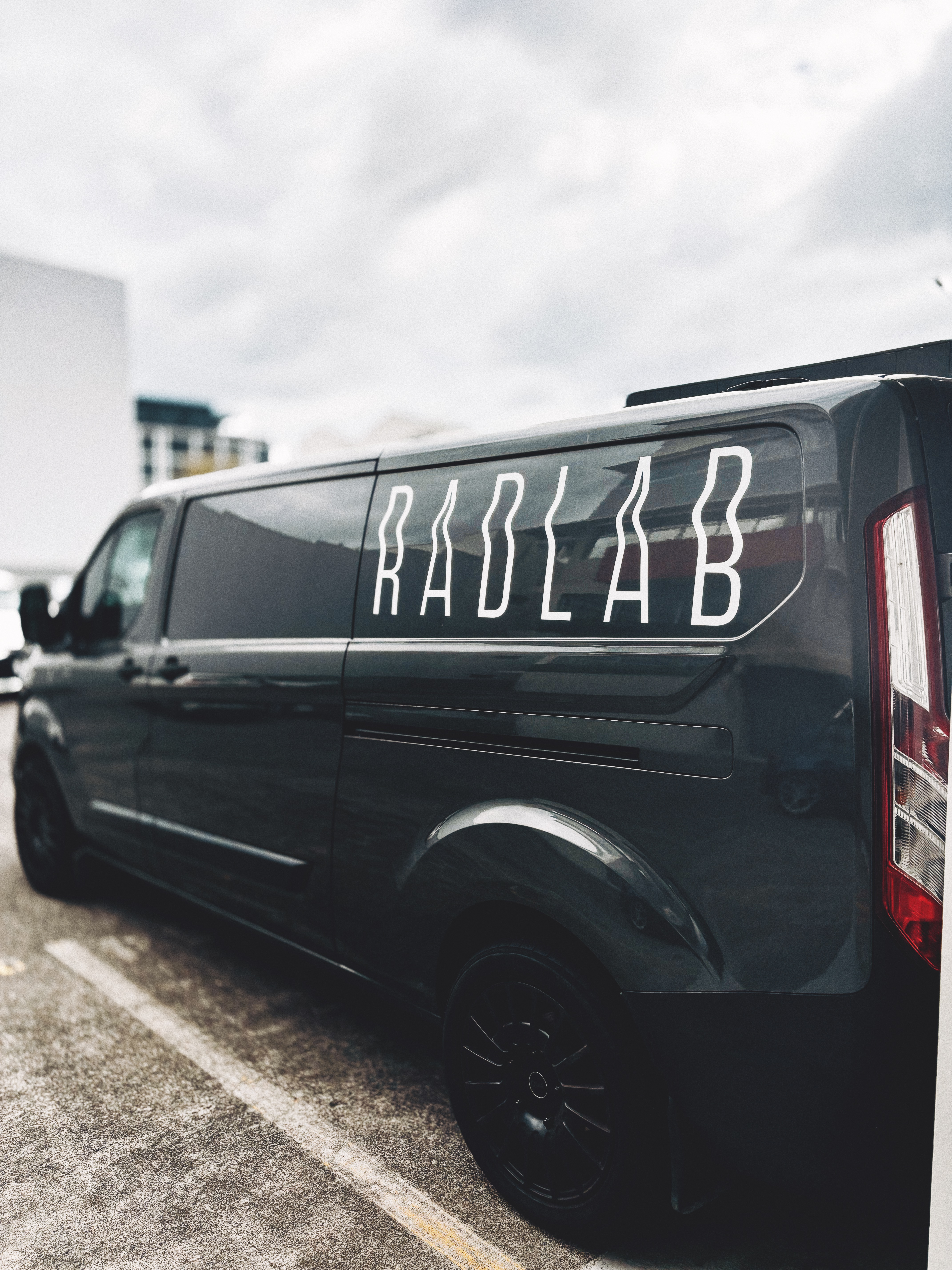 Radlab vehicle signage — custom van lettering design